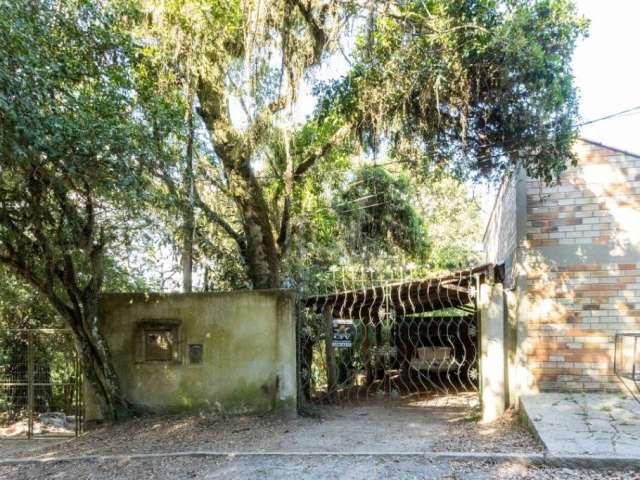 Casa em Belém Novo, com uma vista espetacular.&lt;BR&gt;terreno medindo uma área total de  de quase 2.000m²&lt;BR&gt;Casa de artista plástico, construção diferenciada.&lt;BR&gt;Além da casa, o imóvel 