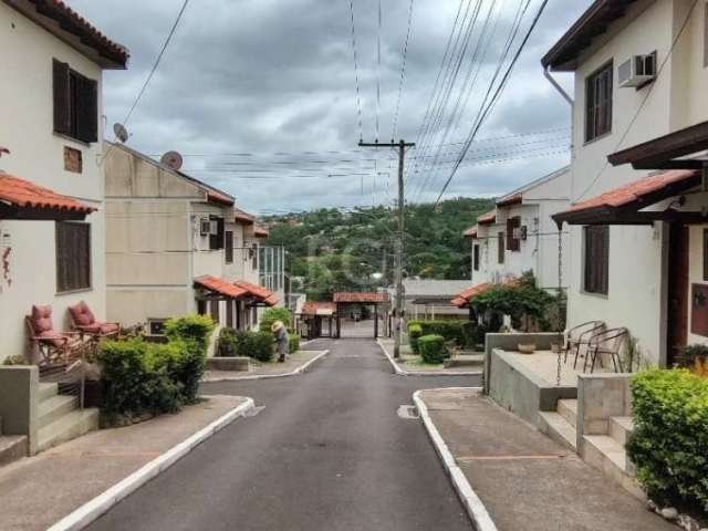 Casa em condomínio, 2 dormitórios, 1 vaga de garagem, no bairro Vila Nova, Porto Alegre/RS    &lt;BR&gt;Casa em condomínio mobiliada com 2 dormitórios, living, cozinha com balcão, pia e armários, chur