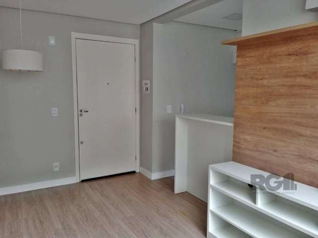 Apartamento semi-mobiliado, sendo 2 dormitórios, living 02 ambientes, cozinha área de serviço, banheiro social, prédio com elevador, possui vaga de garagem, condomínio possui portaria 24 horas, salão 