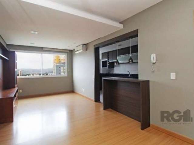 Apartamento de 3 dormitórios sendo 1 suíte, living 2 ambientes, cozinha americana com churrasqueira, semi mobiliado, andar alto!!! Com vaga dupla de garagem.&lt;BR&gt;Prédio com portaria 24h, piscina,