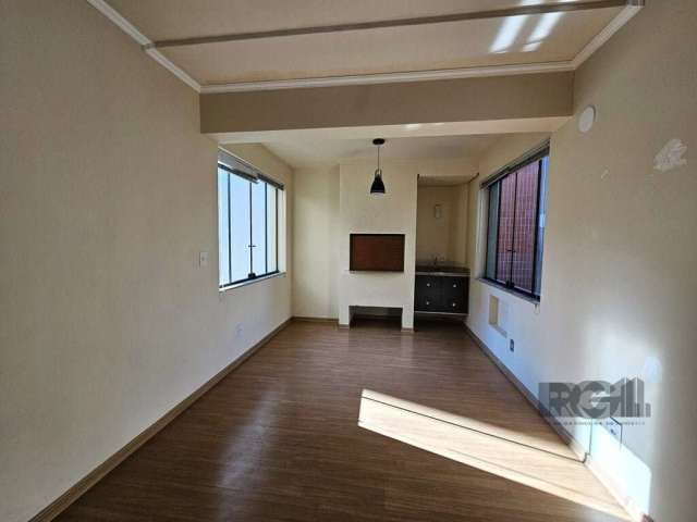 Bairro Auxiliadora. Próximo a 24 de Outubro. Desocupado. Lindo apartamento de 2 dormitórios, com churrasqueira, água quente, cozinha montada, armário em um dormitórios. Vaga de garagem escriturada, ed