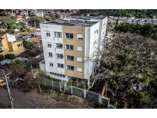 Encante-se com este magnífico apartamento disponível para venda no bairro de Teresópolis. Com 61m², 2 acolhedores dormitórios - incluindo uma suíte - e um banheiro social, este imóvel banhado pelo sol