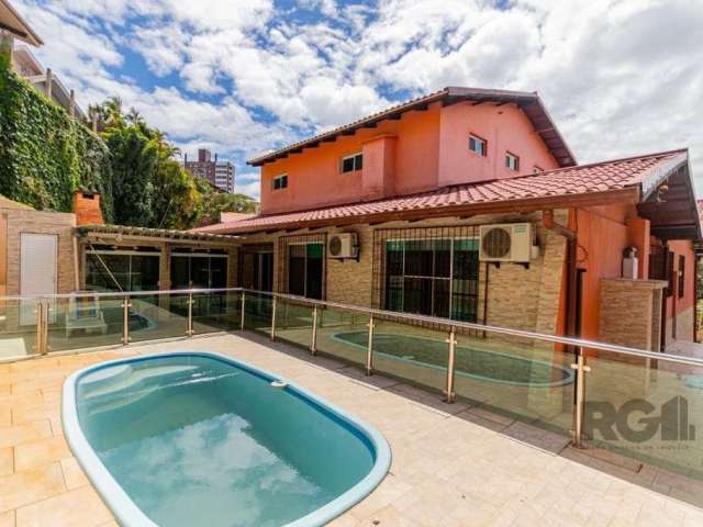 Casa no Bairro Boa Vista mobiliada para comprar  com 4 quartos, sendo 2 suítes (1 master com hidro), living com sala de jantar, churrasqueira, lareira, escritório, piscina, área gourmet, cozinha plane