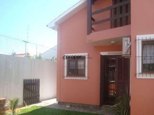 Sobrado com 4 dormitórios à venda, 328 m² por R$ 850.000,00 - Laranjal - Pelotas