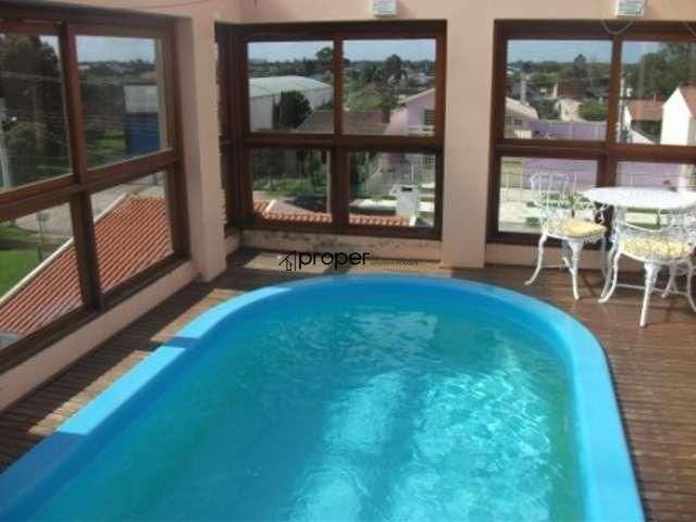 Sobrado com 5 dormitórios à venda, 50 m² por R$ 1.200.000,00 - Três Vendas - Pel