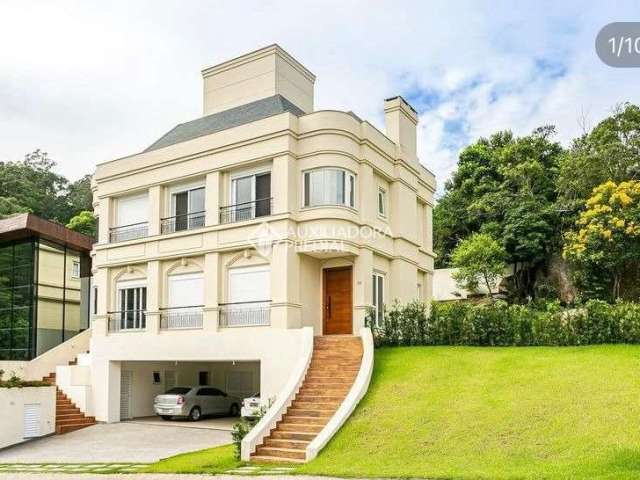 Casa em condomínio fechado com 4 quartos à venda na Rodovia Haroldo Soares Glavan, 4690, Cacupé, Florianópolis, 319 m2 por R$ 4.950.000