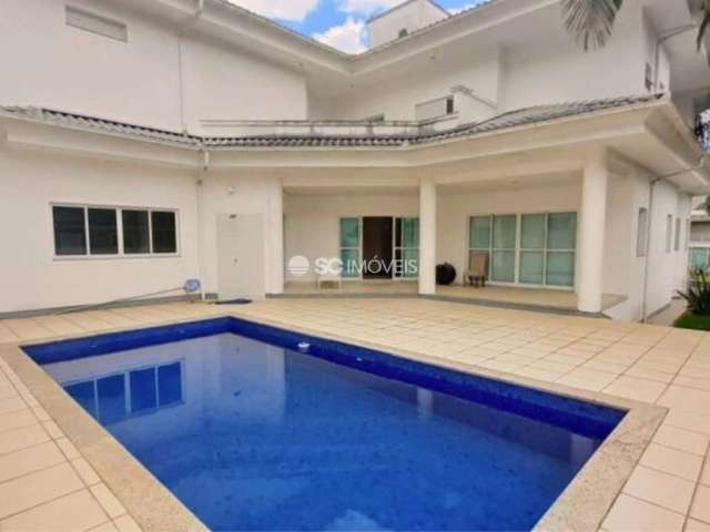 Casa em condomínio fechado com 4 quartos à venda no Cacupé, Florianópolis  por R$ 3.200.000