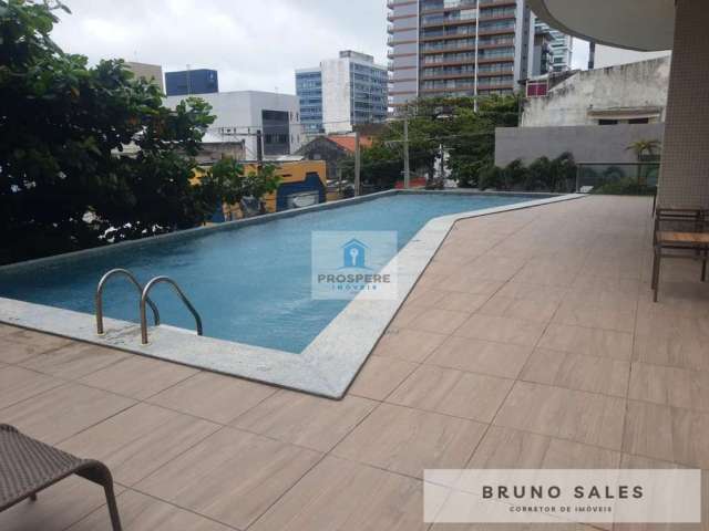 Apartamento quarto e sala na Barra com  vista mar, banheiro, varanda, área de serviço, acabamento em porcelanato, piscina, 1 vaga de garagem.