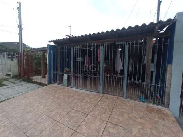 Ótima casa no bairro Hípica, com 3 dormitórios, amplo living, cozinha, espaço gourtmet com churrasqueira, lavanderia em espaço próprio, banheiro social com box,  piso porcelanato, vaga de garagem cobe