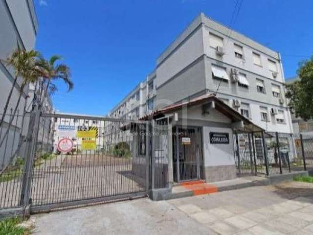 Apartamento com 3 dormitórios à venda no bairro Camaquã, condomínio Cohajuda. &lt;BR&gt;Ótimo apartamento com 3 dormitórios, de frente, piso laminado, com 69,84 m² privativos, cozinha sob medida, arej