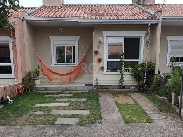 Ótima casa térrea de 2 dormitórios, banheiro c/box de vidro, sala, piso laminado, cozinha, área de serviço, pátio metade fechada com vidro mais sofá feito de tijolo outra metade ar livre com piso frio