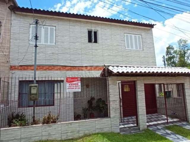 Linda casa em loteamento com acesso somente de moradores, com 2 dormitórios sendo uma suíte com sacada, amplo living, cozinha, lavabo, garagem coberta e fechada, quiosque nos fundos com churrasqueira 