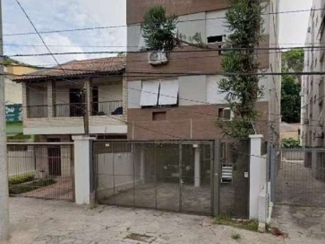 Apartamento de 60m² com 2 dormitórios, uma vaga de garagem e um banheiro social com box de vidro. Possui amplo living de 2 ambientes, cozinha e área de serviço separada, em edifício com poucas unidade