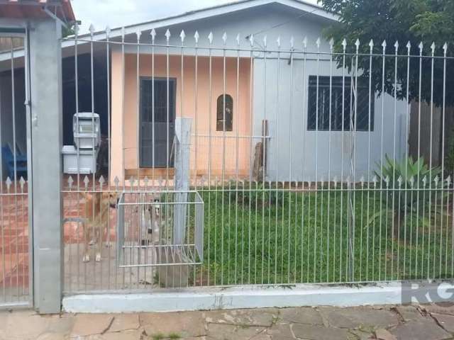 Vende-se residência térrea, conta com 2 dormitórios, 1 banheiro social bem iluminado, living integrado, além de uma cozinha funcional e uma lavanderia prática.&lt;BR&gt;Todas as peças são amplas, gara