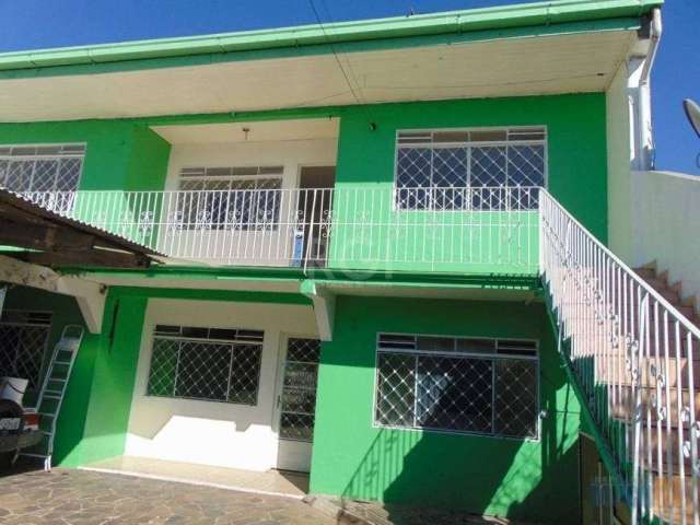 Casa Padrão - Canoas - Harmonia&lt;BR&gt;Casa três dormitórios e dois apartamentos no Bairro Harmonia .&lt;BR&gt;A casa da frente tem três dormitórios , sala , cozinha, banheiro, área de serviço e gar