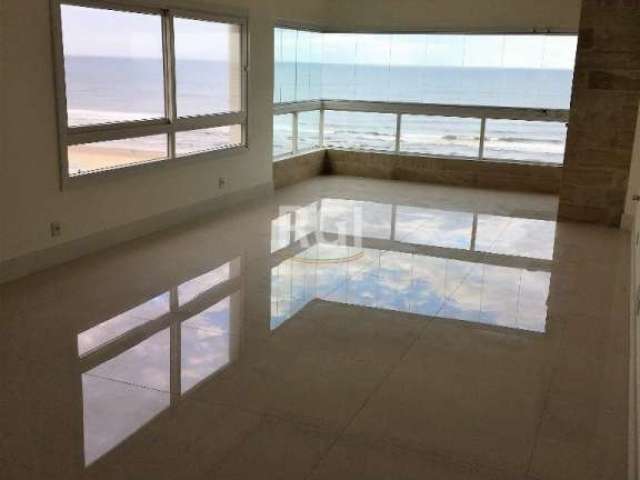 A Libertas convida você para conhecer seu novo lar na beira da praia, &lt;BR&gt;Localizado na praia de Capão da Canoa à 100 metros da praia de Atlântida. Apartamento de frente para o mar, 123m² privat