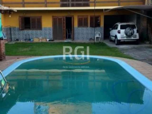 Elo8 Imóveis vende em Cachoeirinha, RS, Lote com Linda Casa residencial em rua tranquila!&lt;BR&gt;Com 03 (três) Dormitórios/quartos (sendo 01 suíte), 02 (dois) box/ vagas de garagem &lt;BR&gt;Descriç