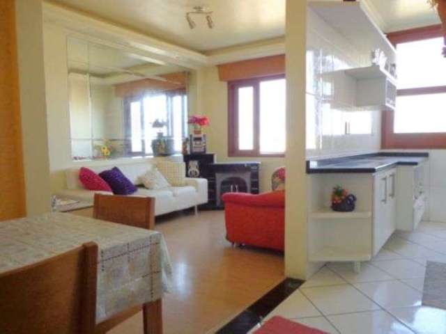 Lindo apartamento de 2 dormitorios reformado. piso laminado na area social e quartos, piso frio no banheiro,area de servico e cozinha. aberturas de madeira, todas novas, portas e janelas. teto com aca