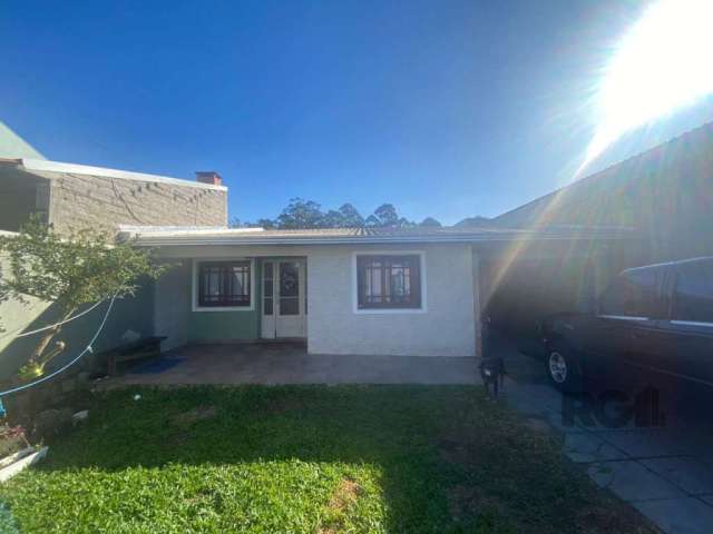 Casa à venda no bairro Centro em Viamão.&lt;BR&gt;Imóvel conta com 03 dormitórios, closet, 02 banheiros, sala de estar, copa, cozinha, área anexa com sala de jantar e lavanderia, garagem coberta e pát