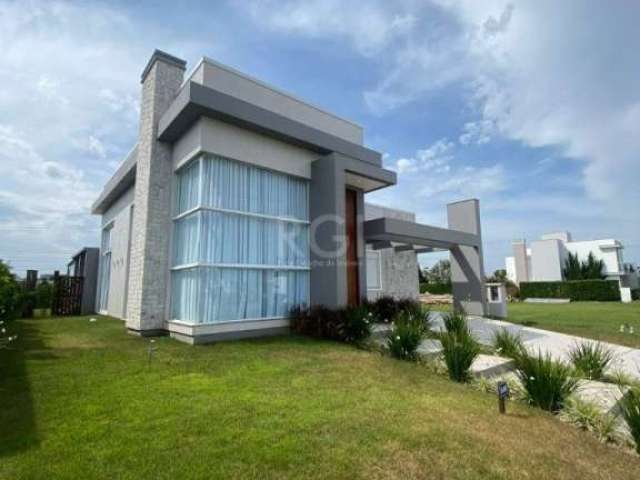 Casa em condominio Ocean Side , semi-mobiliada com cinco dormitórios 5 suites , living amplo com churrasqueira , area de serviço , vaga para 3 carros