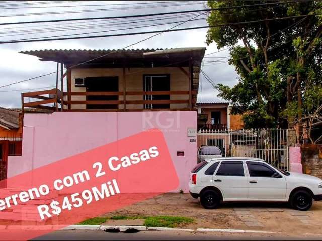 Excelente terreno 10x 30 com 2 sobrados individual. 5 vagas na garagem.  Localizada no bairro Rubem Berta, com 675m². Imóvel com 2 salas, 2 banheiros e pisos em cerâmica, Imóvel com posição solar priv