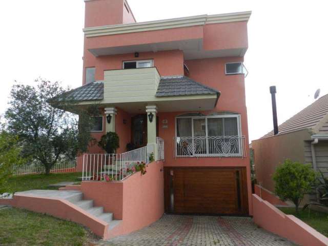 Casa á venda no Condomínio Buena Vista em Viamão.&lt;BR&gt;Imóvel com três dormitórios, sendo três suítes, closet no quarto principal, sacada, sala de estar, sala de jantar, cozinha, banheiros,  escri