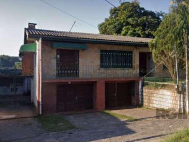 Casa no bairro Helenita em Viamão. &lt;BR&gt;Imóvel de esquina 363m², alvenaria, em terreno com dimensão de 400m² , 4 dormitórios, área de serviço, churrasqueira e pátio amplo com uma casa  edícula ao