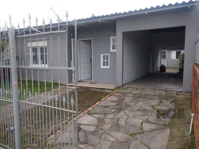 Casa de dois dormitórios, reformada ,piso em porcelanato, banheiro, cozinha, sala, vaga de garagem coberta. Nos fundos churrasqueira, com possibilidade de transformar em área de festas ou até terceiro