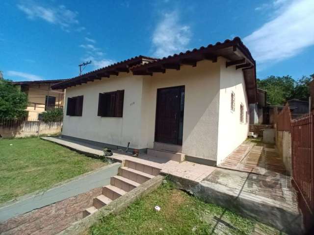 Casa no bairro Taruma em Viamão.&lt;BR&gt;&lt;BR&gt;Com aproximadamente 103m², com pátio individual e 1 vaga de garagem coberta com churrasqueira, 3 dormitórios sendo 1 suíte, sala, cozinha e 1 banhei