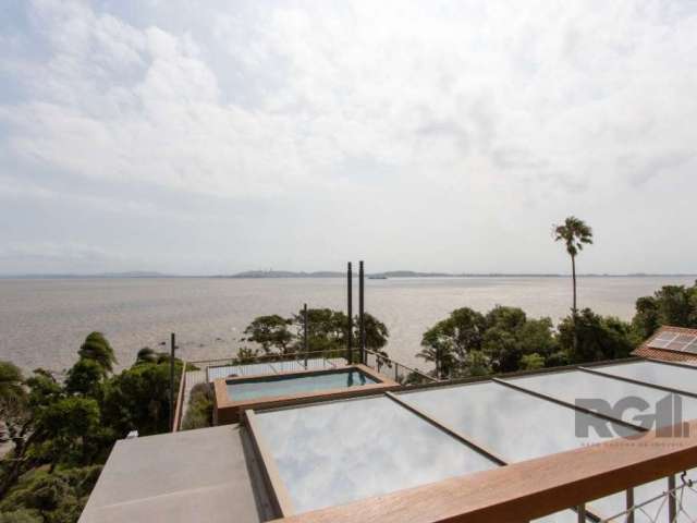 CASA EM CONDOMÍNIO /  520 MTS  /  ZONA SUL / VILA CONCEIÇÃO &lt;BR&gt;&lt;BR&gt;Linda casa em condomínio  com 520 metros privativos ,   vista espetacular do Rio Guaíba.  Arquitetura contemporânea com 