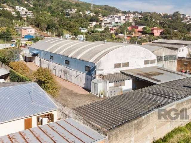 Pavilhão com 1000m² de área construída!&lt;BR&gt;Terreno de  32 x 60,  total 2080m²,  próprio para metalúrgica, equipado com 04 tornos, 02 furadeiras fresadoras, facão para corte de chapa metálica, 01