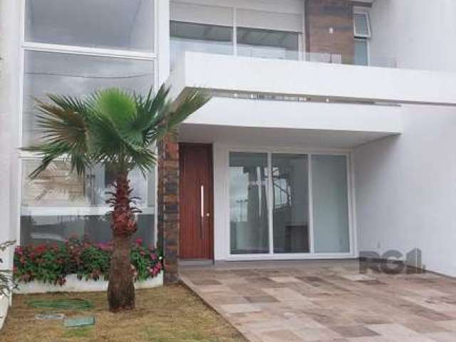 Casa em condomínio 2 dormitórios, 1 suíte com closet, sala estar e jantar, lareira, lavabo, copa cozinha, espaço gourmet, área de serviço reservada, churrasqueira, pátio com espera para spa, vaga de g