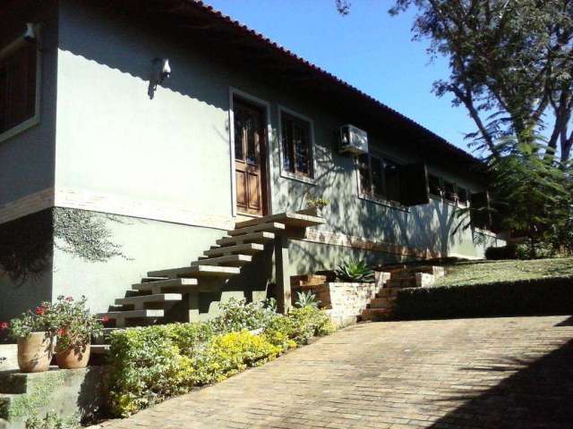 Casa no Condomínio Cantegril Fase V em Viamão. &lt;BR&gt;Imóvel com dois dormitórios, sendo dois suítes, sala, cozinha, banheiro, junker para toda a casa, ar condicionado split na suíte master e quatr