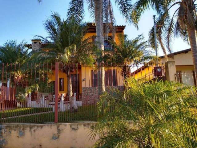 Casa de quatro dormitórios no bairro Mendanha em Viamão.&lt;BR&gt;Imóvel com dois pavimentos: Térreo com sala ampla, lareira, sala de estar, sala de jantar, cozinha, um dormitório e banheiro.&lt;BR&gt