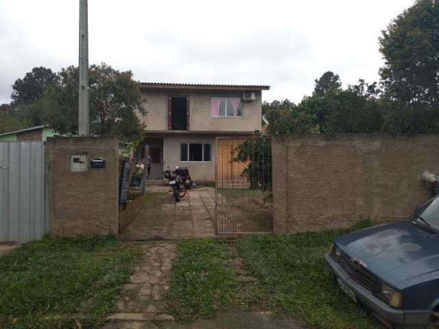 Sobrado no bairro Jardim Viamar em Viamão.&lt;BR&gt;Sobrado com dois dormitórios, sala, cozinha ampla, banheiro e lavanderia revestido de cerâmica, uma vaga de garagem coberta, metragem do terreno de 