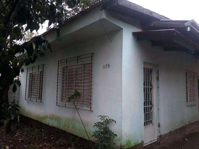 Casa de três dormitórios no Dom Feliciano no Centro de Viamão.&lt;BR&gt;Imóvel com duas salas amplas, três dormitórios, dois banheiros, uma cozinha com todas as esperas de água e luz, quintal, pátio d