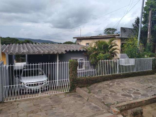 Casa à venda Bairro São Lucas em Viamão.&lt;BR&gt;&lt;BR&gt;Imóvel com dois dormitórios, sala, cozinha, banheiro, área de serviço e pátio.&lt;BR&gt;Jk 1 com um dormitório, sala-cozinha e banheiro.&lt;