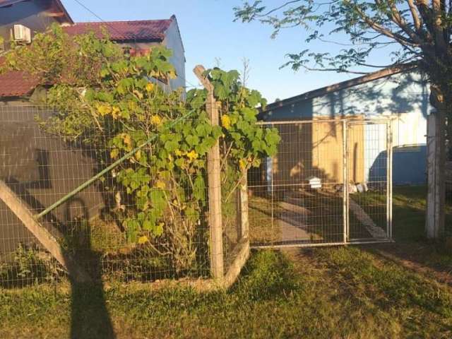 Terreno á venda no bairro São Tomé em Viamão.&lt;BR&gt;Terreno com duas casas, com possibilidade de construção .