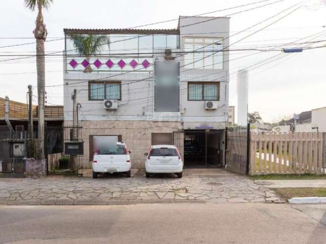 Ótima oportunidade ! Prédio misto(Residencial / Comercial) á venda na Eduardo Prado , bairro Cavalhada.&lt;BR&gt;Ótimo apartamento com 3 dormitórios, living 2 ambientes, 2 banheiros, cozinha , area de