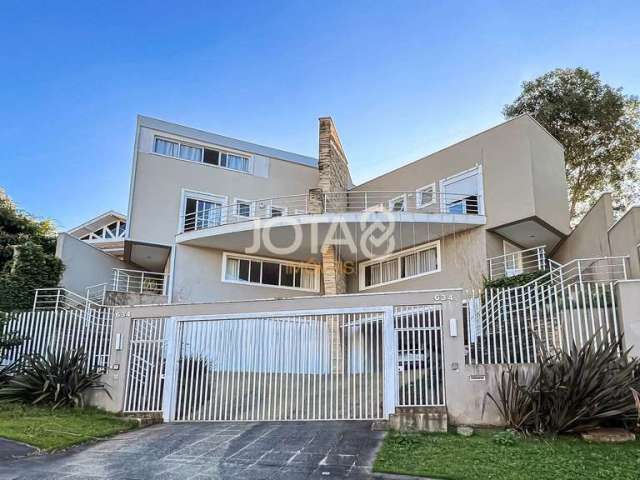 Excelente casa com 4 suítes em Santa Felicidade!!