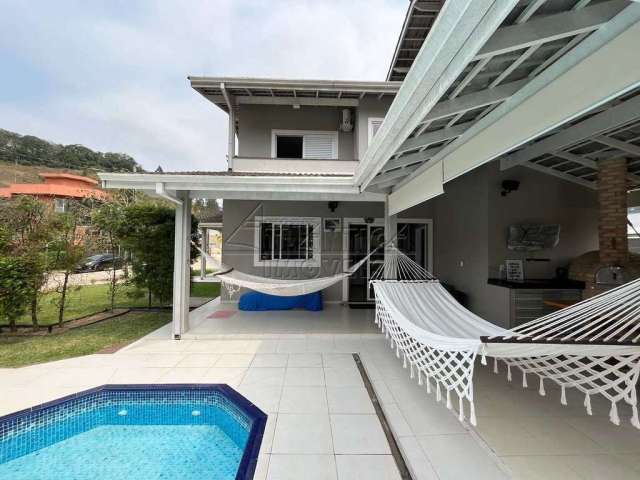 Casa em condomínio fechado com 3 quartos à venda no Ubatuba Country, Ubatuba  por R$ 1.800.000