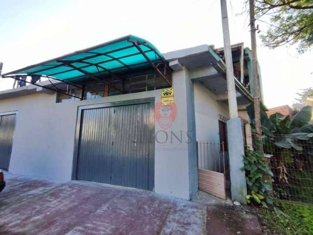 Casa com 2 dormitórios para alugar, 70 m² por R$ 1.500,00/mês - Natal - Gravataí/RS