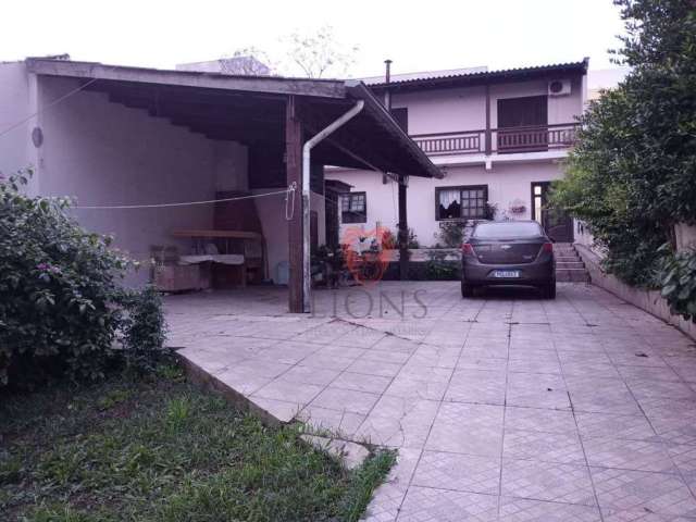 Casa com 3 dormitórios à venda, 140 m² por R$ 690.000,00 - Vera Cruz - Gravataí/RS