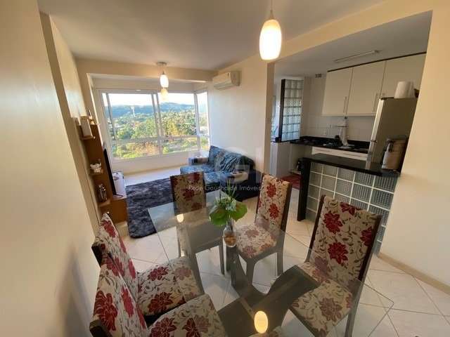 Apartamento 3 dormitórios com uma suíte, 1 vaga, bairro Cavalhada.    &lt;BR&gt;  &lt;BR&gt;Excelente Apartamento em andar alto, com vista livre; 03 dormitórios, sendo 1 suíte, Living Duplo, Cozinha a