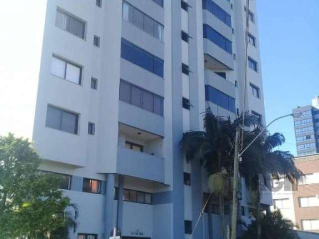 Apartamento em Torres . Praia Grande Com três dormitórios sendo uma suite , sala de estar e jantar inetgrados com churrasqueira , vaga para um carro