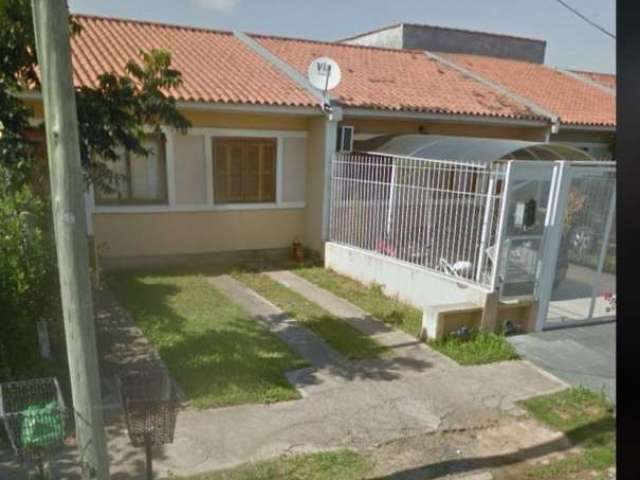 Casa térrea 2 dormitórios no Loteamento Moradas do sul sendo um deles suite amplo living, pátio na frente e nos fundos, casa toda murada, pintura nova, cozinha conceito americano, lavabo, área de serv