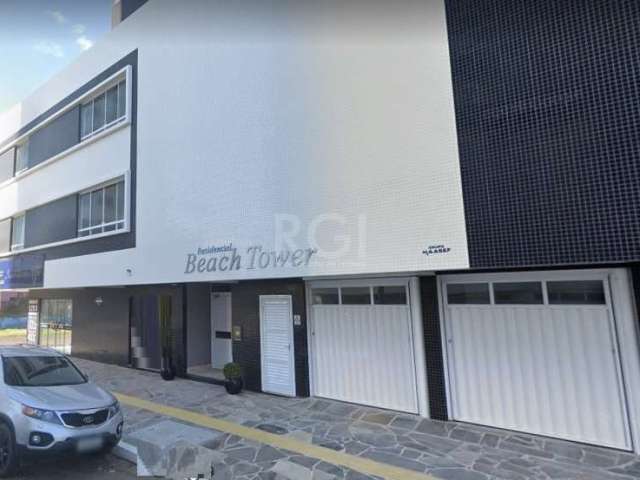 Ótimo apartamento no Condomínio Beach Tower, no Centro de Tramandaí, NOVO (nunca habitado), semi mobiliado, andar alto, vista para o mar. Possui sala ampla para 2 ambientes com churrasqueira, 2 dormit