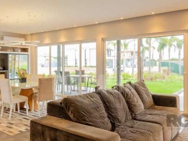 Casa em condomínio com 425 m², com 4 dormitórios sendo 4 suítes e 4 vagas de garagem á venda no bairro Sans Souci.&lt;BR&gt;A casa possui lareira na sala de estar, ilha gourmet junto à sala de jantar,