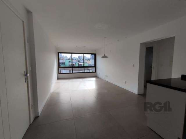 Apartamento de 2 suites com churrasqueira e vaga para dois carros, bairro Petrópolis!&lt;BR&gt;&lt;BR&gt;Andar alto, muito sol e ventilação! Cozinha integrada ao living, lavabo. São duas suites, banhe