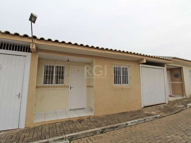 Casa em condomínio na ERECHIM com 02 dormitórios, área de serviço, banheiro social, churrasqueira, cozinha, garagem para dois carros, pátio, sala de estar, . Piso: Cerâmica, 1 banheiro(s).&lt;BR&gt;&l